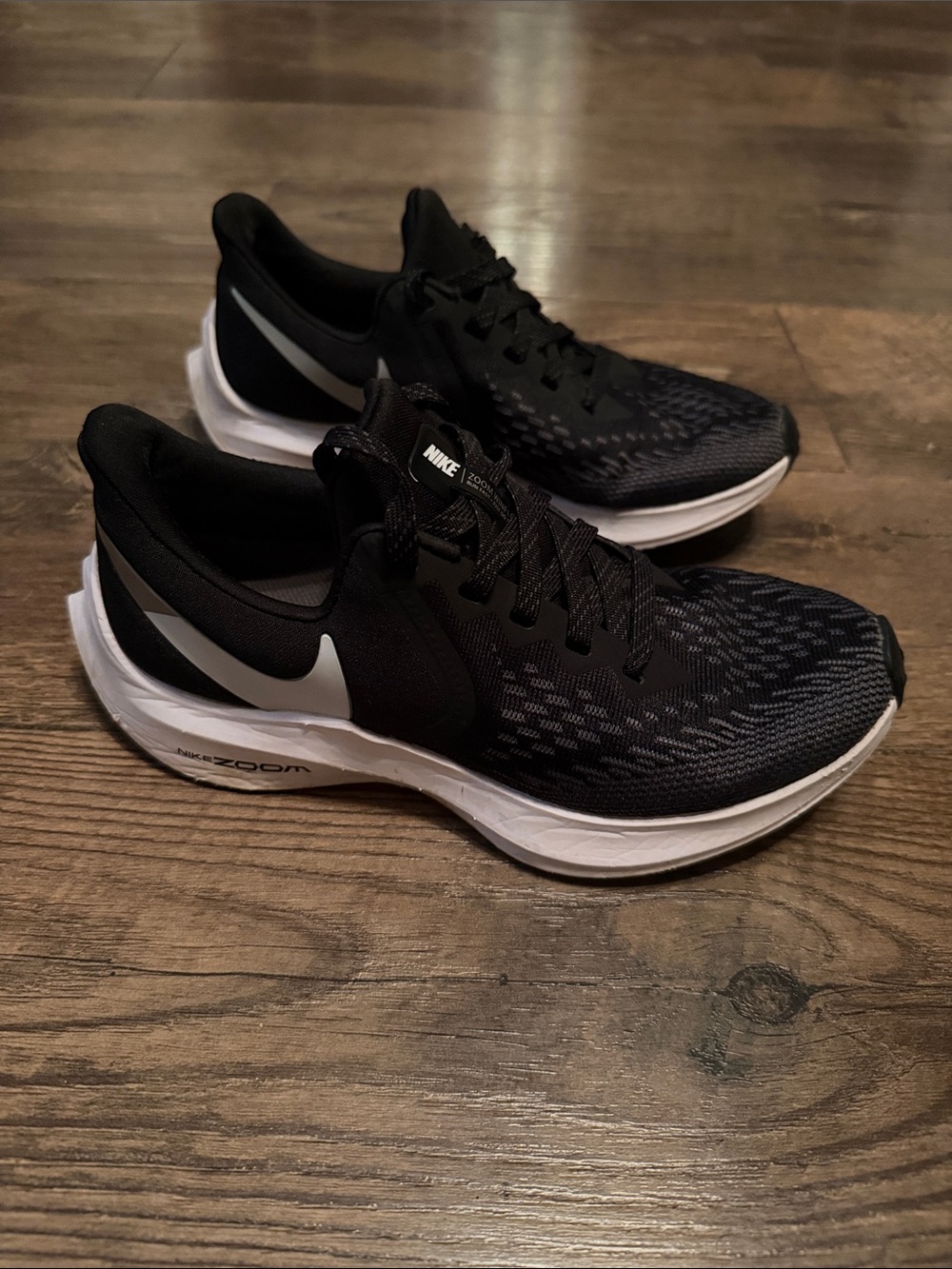 Nike women’s Black and White Zoom Running Sneakers